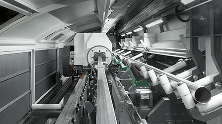 Laser cutting machine for tubes and profiles with automatic set-up